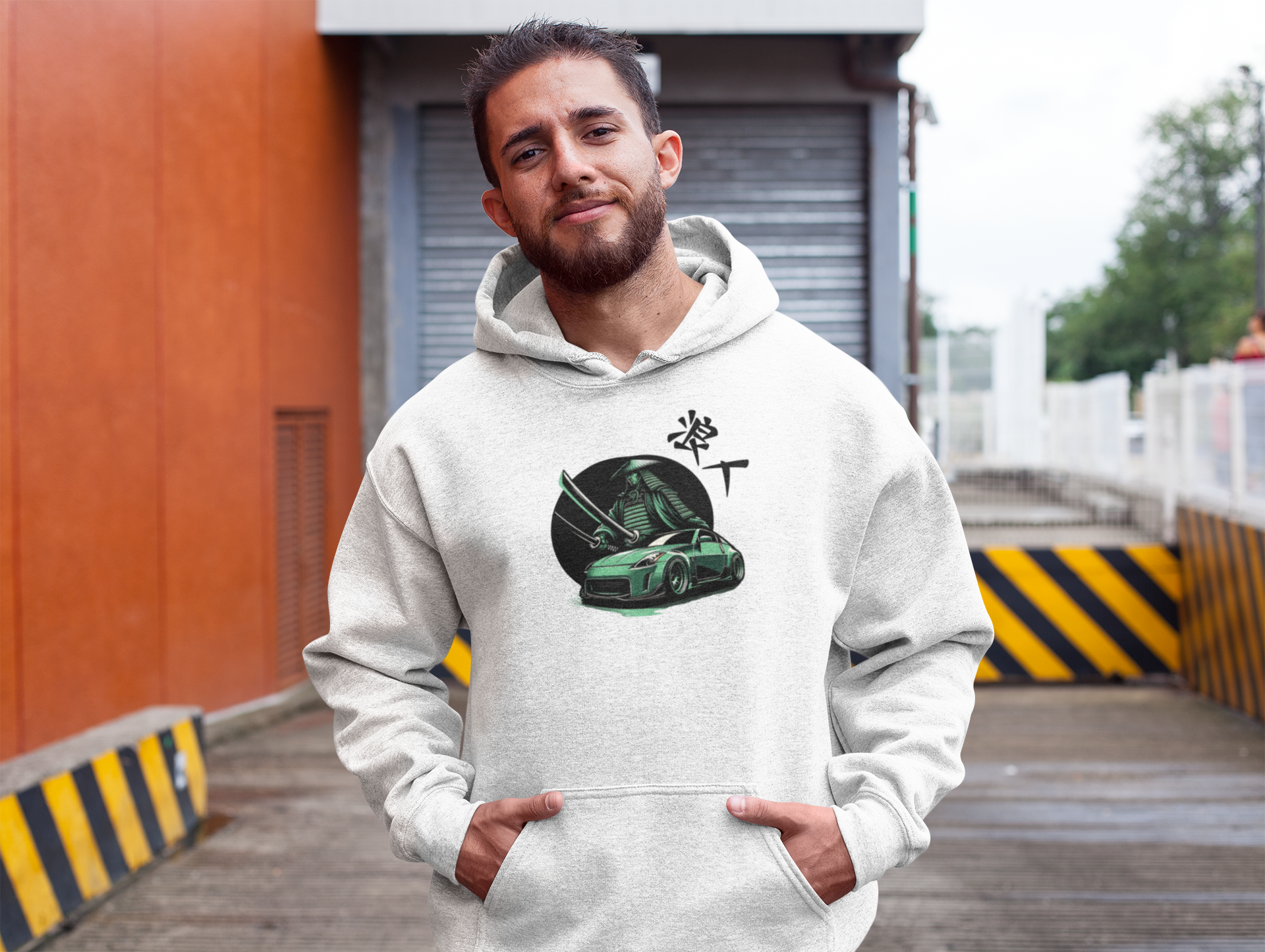 young man wearing a jdm hoodie